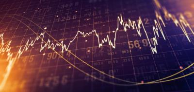 Macro view of a screen of trading terminal with abstract financial graph and digits